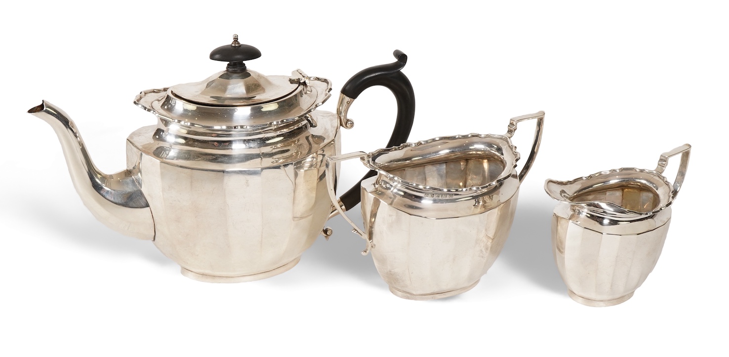 A George V silver three piece tea set by William Devonport